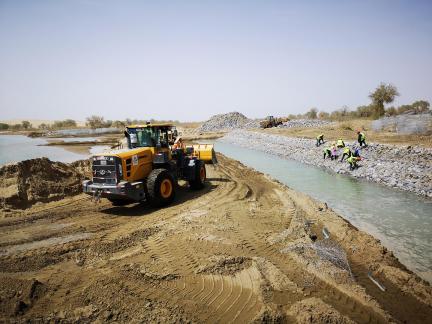 Excavate and level the road 2