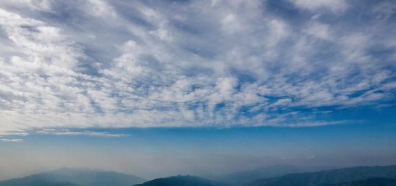 Mountains amd white clouds