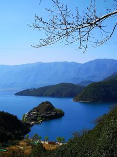 Mountains surround water 20