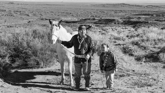 Man and Boy and White Horse