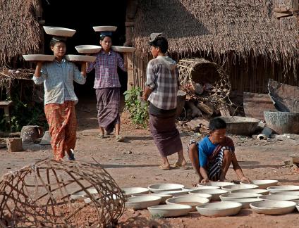 Burma putting pots in sun to dry