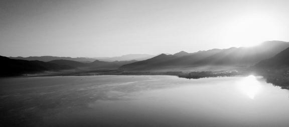 Mountains surround water 1