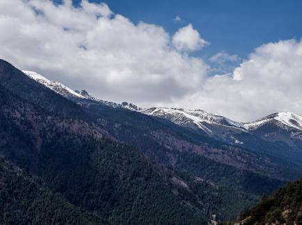 Snowy Peaks and Clear Clouds 1