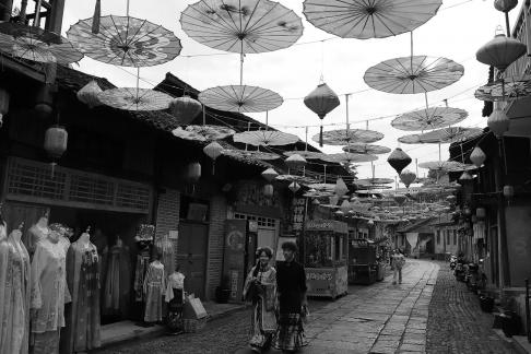 An oil paper umbrella in a lane 6