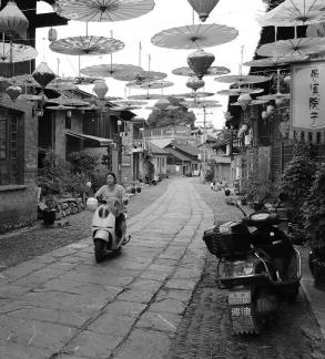 An oil paper umbrella in a lane 8