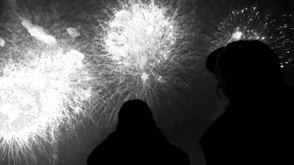 The silhouette under the fireworks1