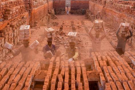 Loading bricks over head 2