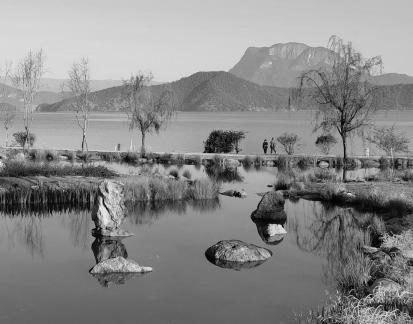Mountains surround water 6