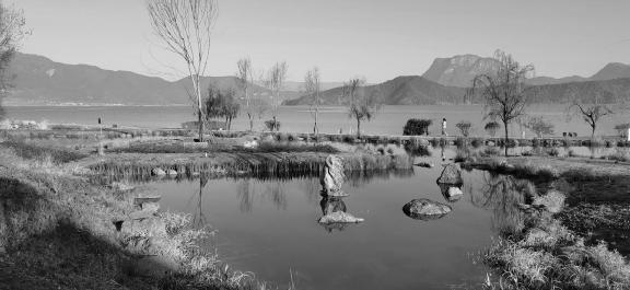 Mountains surround water 7