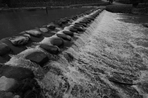 White waves chasing stones 2
