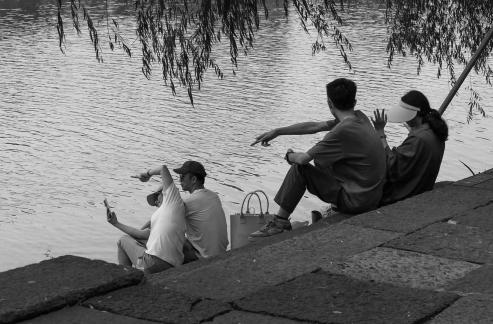 Idle talk on the river bank