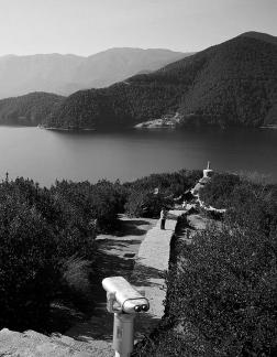 Mountains surround water 18