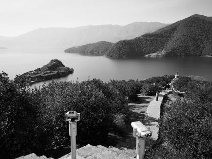 Mountains surround water 19