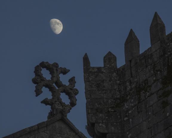 The moon behind the church