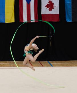 Green ribbon rhythmic gymnast