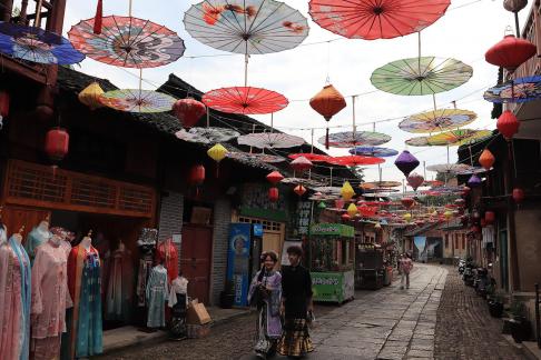 An oil paper umbrella in a lane 6
