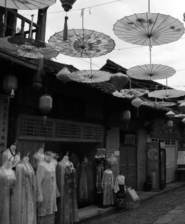An oil paper umbrella in a lane 4