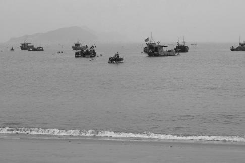 Fishing boats at sea 16