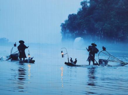 fishing fires in the mist
